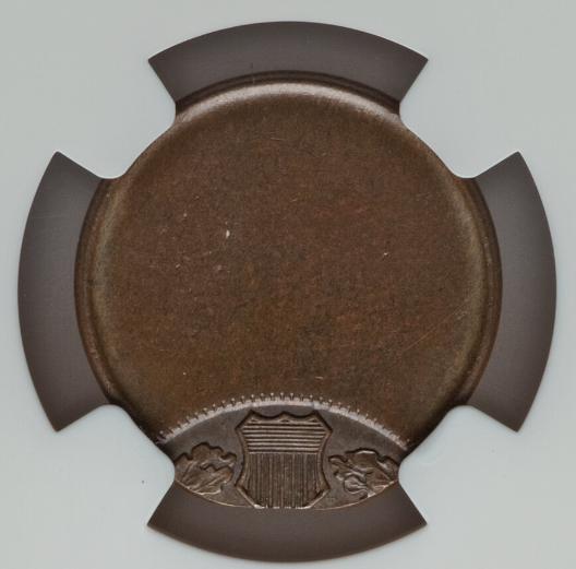 1909 Indian Head Penny off-center strike error showing design shifted with blank planchet area and date still visible